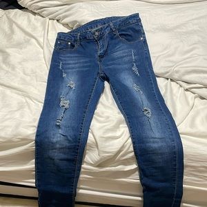 Distressed 14 blue jeans very stretchy and flattering with cuffs at ankles euc